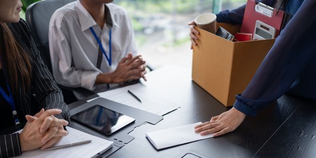 réunion entre 3 personnes dans le cadre d'une reconversion professionnelle